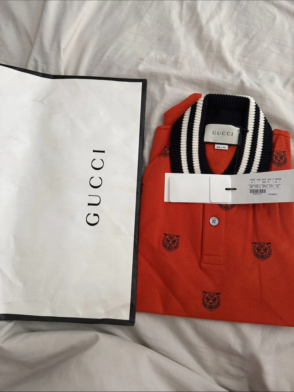 Gucci Men's Orange Polo with Black Tiger Motif & Striped Collar